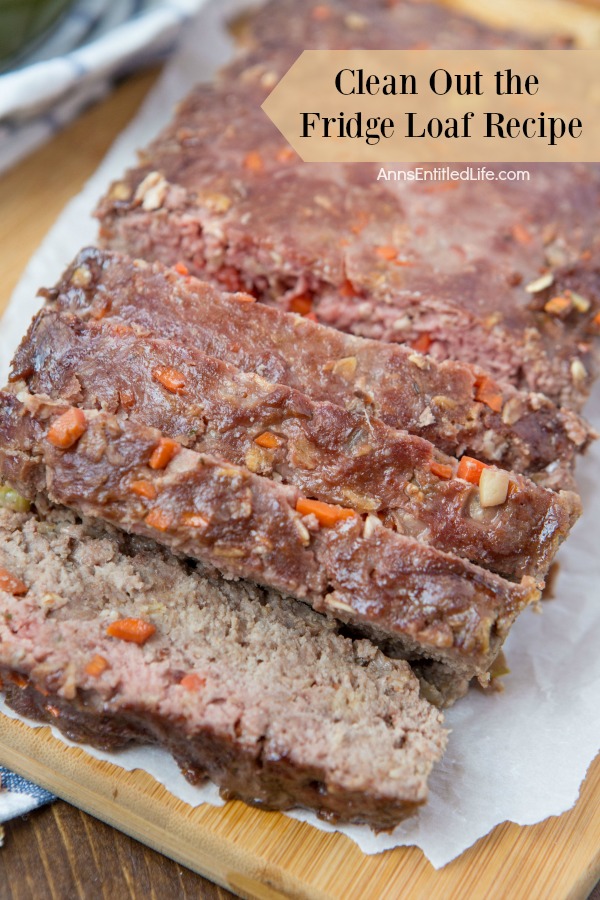meatloaf on top of parchment paper on a cutting board