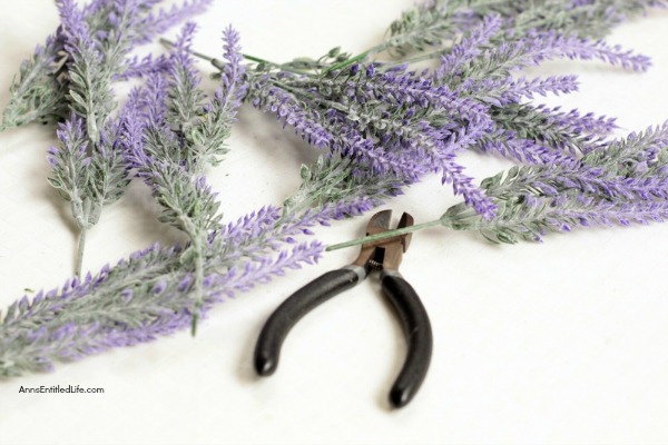 Simple Lavender Grapevine Wreath DIY. Encourage peace and relaxation in your home by making and using this scented lavender wreath. Easy to make, this simple lavender grapevine wreath comes together in about 15 minutes.