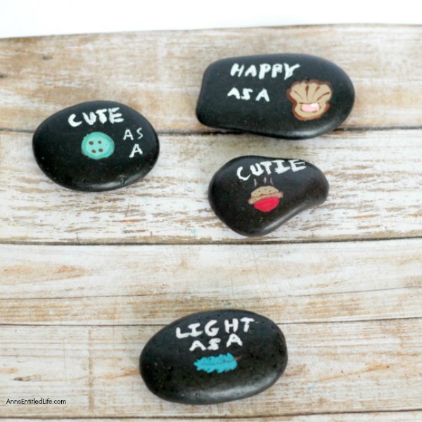 Compliment Painted Rocks. How to paint rocks. This easy painted rocks tutorial has many rock painting ideas for a beginner. Whether giving as a gift, painting rocks for the garden, or just painting a fun, decorative rock for the family room shelf, these compliment painted rocks are adorable and simple to make.