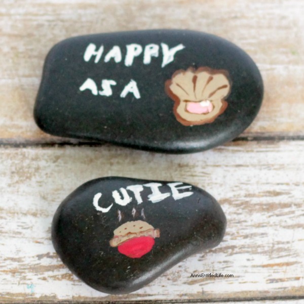 Compliment Painted Rocks. How to paint rocks. This easy painted rocks tutorial has many rock painting ideas for a beginner. Whether giving as a gift, painting rocks for the garden, or just painting a fun, decorative rock for the family room shelf, these compliment painted rocks are adorable and simple to make.