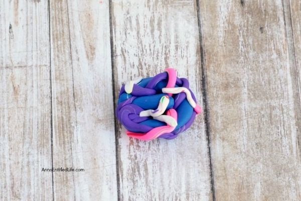 DIY Galaxy Polymer Clay Jewelry Bowl. It is so lovely to see the swirling galaxy colors of pink, purple, and blue. This galaxy clay jewelry bowl turned out amazing, and I look forward to using it every day! Follow these instructions to make your own Galaxy Polymer Clay Jewelry Bowl!