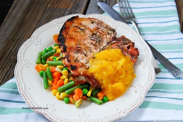 Easy Grilled Pork Chops Recipe with Peach Rum Sauce. Looking for a simple, delicious summer pork chops recipe? This easy grilled pork chops recipe comes with a side of delicious peach rum sauce. The pairing is divine. So up your grilling game with this easy pork chops recipe for dinner tonight! Yum.