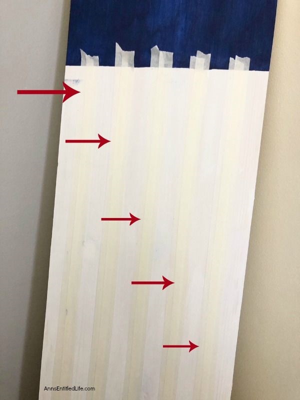 Wooden American Flag DIY Craft. This rustic American flag craft project is simple to make. Large enough for outdoor use, this rustic American flag craft can also be used inside the house. These easy step by step instructions in this short tutorial will show you how to make this wooden American flag craft is no time flat!