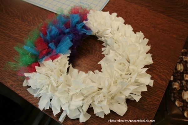 Easy Unicorn Wreath DIY. This simple to make sparkly unicorn rag wreath is an adorable and whimsical take on a unicorn wreath. Follow the step-by-step instructions of this detailed tutorial to make this fun homemade wreath. From the multicolored mane, sparkly white coat, and fanciful ears and cone, this delightful unicorn wreath is a playful take on the great mythical creature.