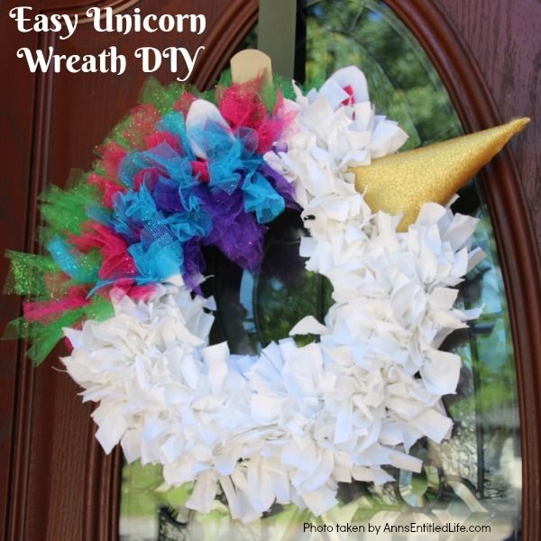 Easy Unicorn Wreath DIY. This simple to make sparkly unicorn rag wreath is an adorable and whimsical take on a unicorn wreath. Follow the step-by-step instructions of this detailed tutorial to make this fun homemade wreath. From the multicolored mane, sparkly white coat, and fanciful ears and cone, this delightful unicorn wreath is a playful take on the great mythical creature.