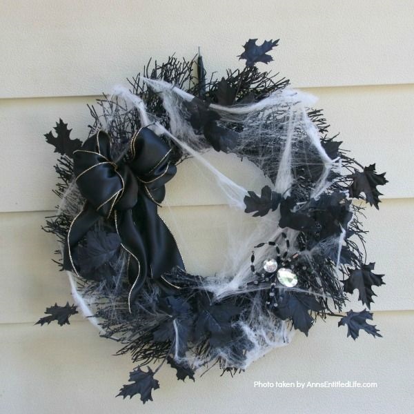 DIY Spooky Spider Halloween Wreath. This simple to make homemade Halloween wreath is spook-tacular - and takes only 15 minutes to put together. If you are looking for easy do it yourself Halloween decor, look no further than this DIY Spooky Spider Halloween Wreath, and make one today!