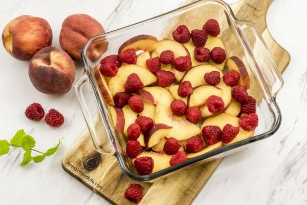 Raspberry Peach Cobbler Recipe. The sweet taste of plump, juicy peaches and the tart taste of raspberries combine for a lovely cobbler that will have your whole family asking for seconds.  Give this old-fashioned, easy to make raspberry peach cobbler a recipe tonight!