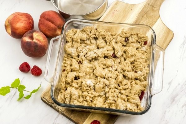 Raspberry Peach Cobbler Recipe. The sweet taste of plump, juicy peaches and the tart taste of raspberries combine for a lovely cobbler that will have your whole family asking for seconds.  Give this old-fashioned, easy to make raspberry peach cobbler a recipe tonight!