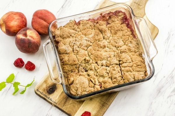 Raspberry Peach Cobbler Recipe. The sweet taste of plump, juicy peaches and the tart taste of raspberries combine for a lovely cobbler that will have your whole family asking for seconds.  Give this old-fashioned, easy to make raspberry peach cobbler a recipe tonight!