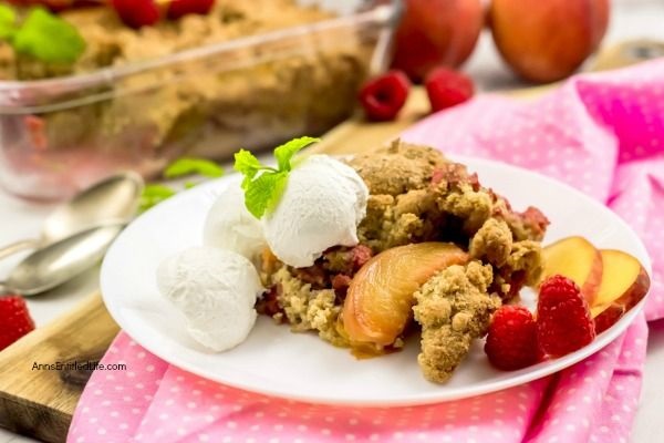 Raspberry Peach Cobbler Recipe. The sweet taste of plump, juicy peaches and the tart taste of raspberries combine for a lovely cobbler that will have your whole family asking for seconds.  Give this old-fashioned, easy to make raspberry peach cobbler a recipe tonight!