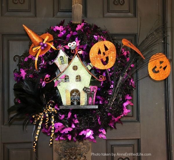 Haunted House Halloween Wreath. This whimsical haunted house Halloween wreath is an easy to put together - truly a 15-minute craft!  If you are looking for simple Halloween wreath ideas, look no further than this fun haunted house Halloween wreath DIY.