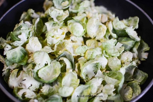 Leafy Brussels Sprouts with Bacon Recipe. If you enjoy Brussels sprouts, I bet you will love this easy to make leafy Brussels sprouts and bacon recipe. Easy to make, this delicious Brussels sprouts recipe comes together quickly and easily for a perfect fall/winter side dish. This pairs well with chicken, pork, turkey, or ham! Simply a fantastic autumn side dish recipe the entire family will enjoy.