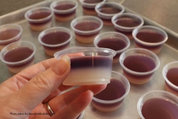 Peanut Butter and Jelly Jello Shots Recipe. This Peanut Butter and Jelly Jello Shots Recipe is the grownup version of your favorite childhood sandwich. If you liked PB&J sandwiches as a kid, you are going to love these PB&J jello shots as an adult. Simple to make, these jello shots are great for parties, tailgating, and more!