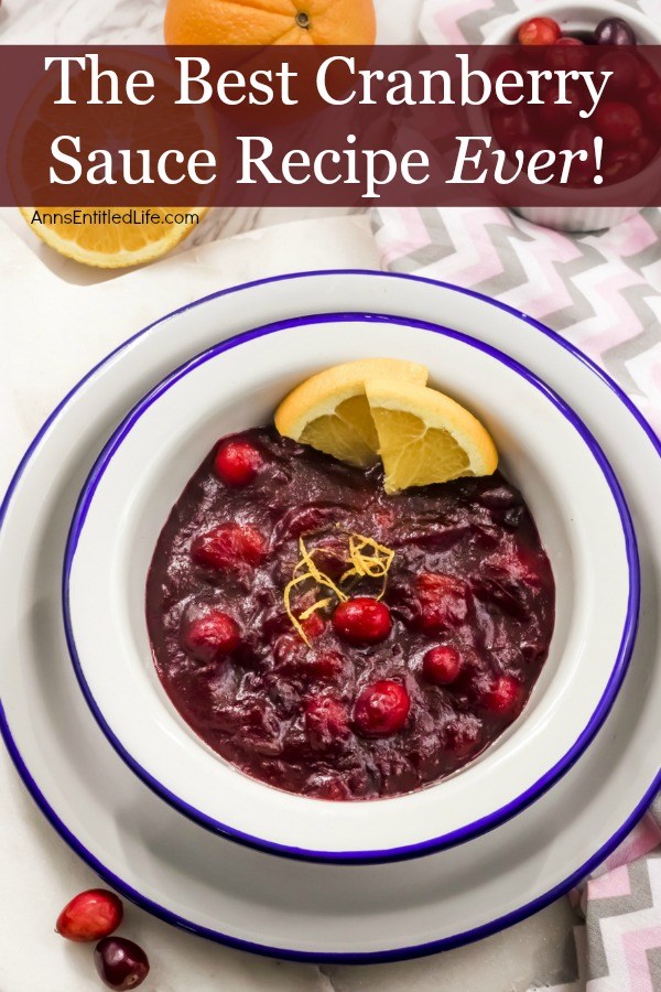 an overhead view of a white bowl with blue trim is filled with cranberry sauce