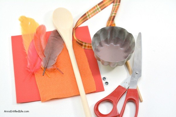 Using these step-by-step instructions, this simple to make Turkey Spoon Puppet Craft comes together in no time flat! Perfect to use as a puppet, or for more adult decor in centerpieces or flower pots, of as a take home party favor, this adorable wooden spoon craft is a delightful Thanksgiving turkey craft.