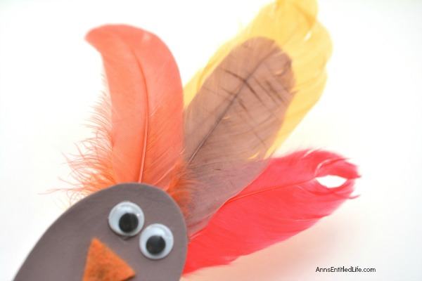 Using these step-by-step instructions, this simple to make Turkey Spoon Puppet Craft comes together in no time flat! Perfect to use as a puppet, or for more adult decor in centerpieces or flower pots, of as a take home party favor, this adorable wooden spoon craft is a delightful Thanksgiving turkey craft.