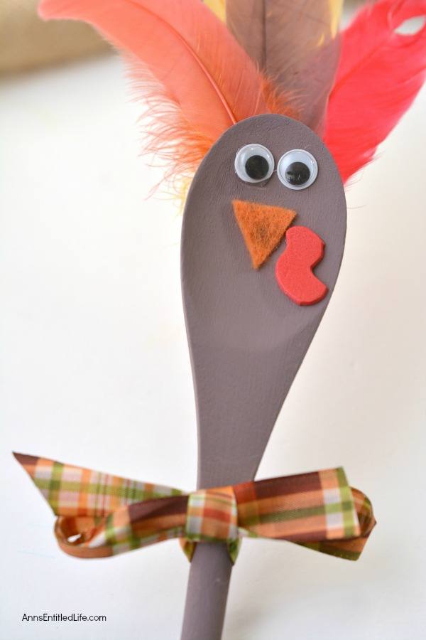 Using these step-by-step instructions, this simple to make Turkey Spoon Puppet Craft comes together in no time flat! Perfect to use as a puppet, or for more adult decor in centerpieces or flower pots, of as a take home party favor, this adorable wooden spoon craft is a delightful Thanksgiving turkey craft.