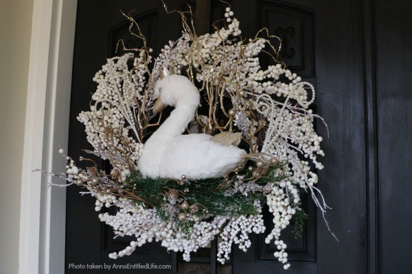 Golden Swan Wreath DIY. This stunning wreath takes only 15 minutes to make! Perfect for so many holidays, party functions (think bridal or shower), or as a year round wreath with a bit of bling, this unusual swan wreath is lovely wall décor or door décor!