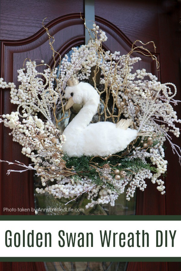 Golden Swan Wreath DIY. This stunning wreath takes only 15 minutes to make! Perfect for so many holidays, party functions (think bridal or shower), or as a year-round wreath with a bit of bling, this unusual swan wreath is lovely wall décor or door décor!