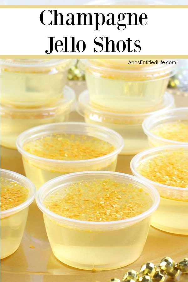 a close-up of a six chamagne jello shots in souffle cups. In the background is a stack of more champagne jello shots.