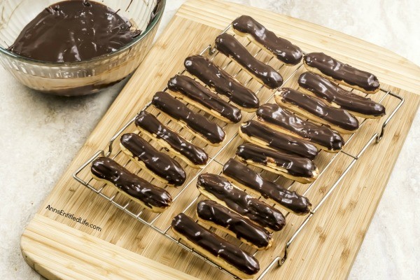 Homemade Chocolate Eclair Recipe. There is no more sophisticated pastry than an eclair! From filling a holiday dessert tray, to an elegant shower confection, or simply passed around at a party on a tray, this homemade chocolate eclair recipe will satisfy and impress with its creamy rich filling, and slightly sweet chocolate ganache topping. These homemade chocolate eclairs are an outstanding dessert perfect for any occasion.