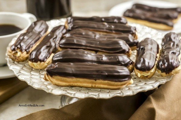 Homemade Chocolate Eclair Recipe. There is no more sophisticated pastry than an eclair! From filling a holiday dessert tray, to an elegant shower confection, or simply passed around at a party on a tray, this homemade chocolate eclair recipe will satisfy and impress with its creamy rich filling, and slightly sweet chocolate ganache topping. These homemade chocolate eclairs are an outstanding dessert perfect for any occasion.