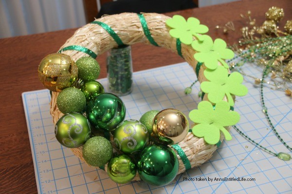 St. Patrick's Day Luck o' the Irish Wreath. Dress up your front door for St Patty's day with this easy to make St. Patrick's Day wreath door decoration. This is a fast, inexpensive wreath decoration that just might bring a bit of the luck o' the Irish your way.