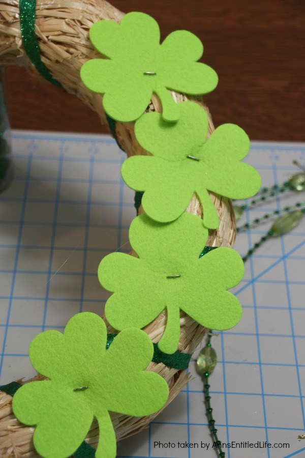 St. Patrick's Day Luck o' the Irish Wreath. Dress up your front door for St Patty's day with this easy to make St. Patrick's Day wreath door decoration. This is a fast, inexpensive wreath decoration that just might bring a bit of the luck o' the Irish your way.