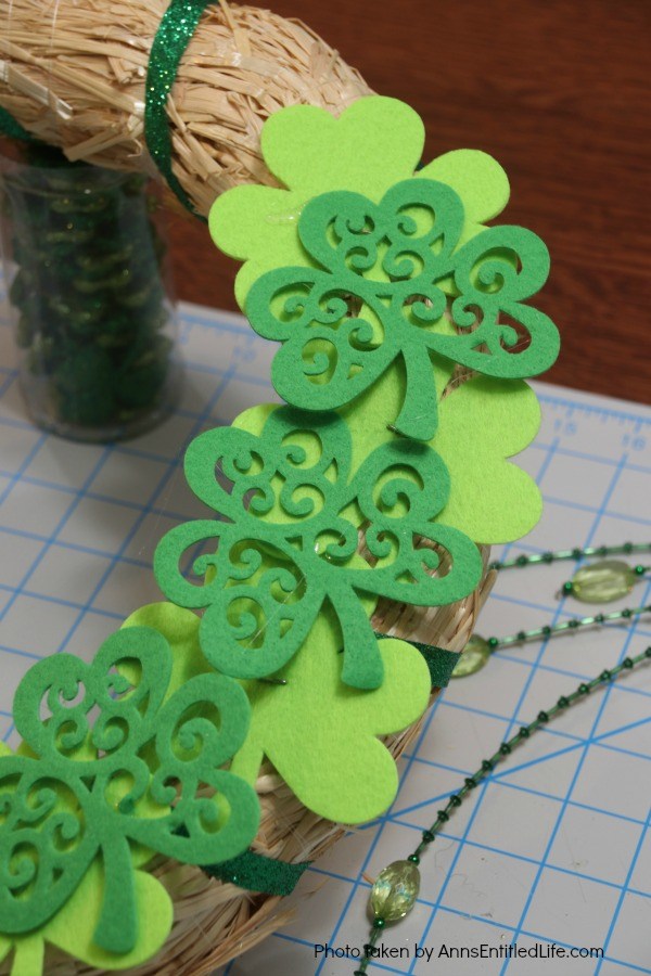 St. Patrick's Day Luck o' the Irish Wreath. Dress up your front door for St Patty's day with this easy to make St. Patrick's Day wreath door decoration. This is a fast, inexpensive wreath decoration that just might bring a bit of the luck o' the Irish your way.