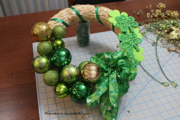 St. Patrick's Day Luck o' the Irish Wreath. Dress up your front door for St Patty's day with this easy to make St. Patrick's Day wreath door decoration. This is a fast, inexpensive wreath decoration that just might bring a bit of the luck o' the Irish your way.