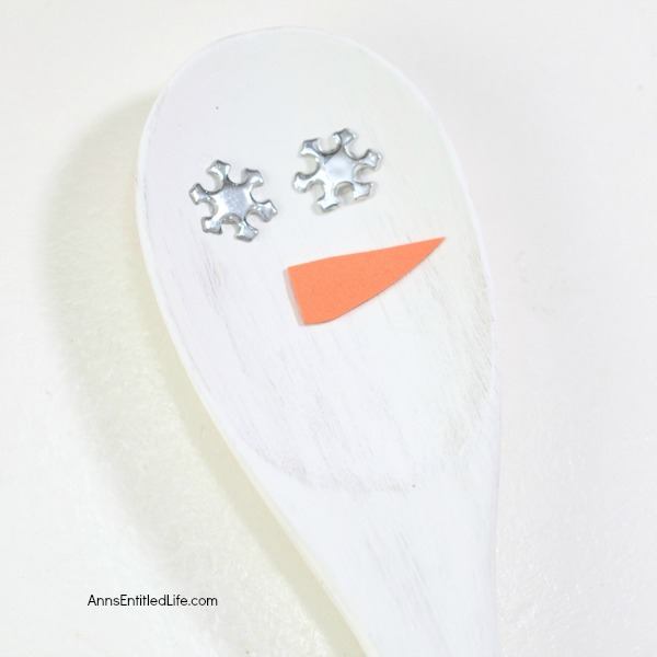 Wooden Spoon Craft: Snowman Spoon Puppet. Bring a little bit of the cold inside this winter and make your own Snowman spoon with these easy step by step instructions! This adorable little 
