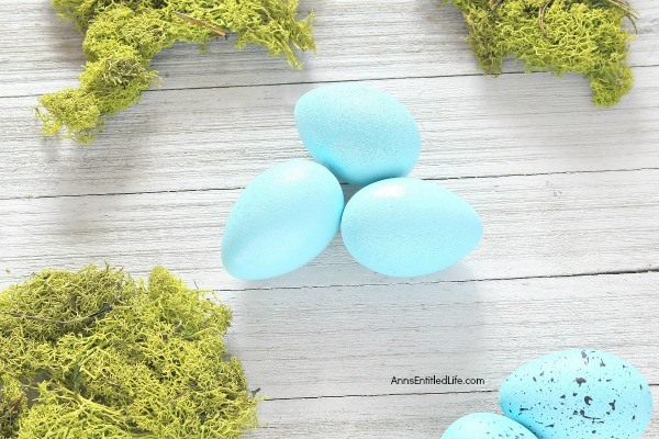 Hand Painted Robin Eggs Bird Nest Décor. These beautiful blue robin eggs make perfect springtime décor! Simple to make, these robin eggs are ready in no time flat. Your centerpiece never looks so festive with so little effort! These are great for Easter too. Simply follow this easy step-by-step tutorial to make your stunning spring centerpiece, tabletop side piece, or mantel decoration, today!