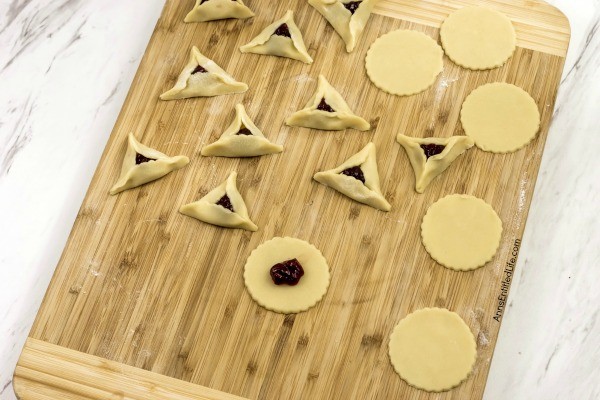 Jam Filled Cream Cheese Cutout Cookies Recipe. These delicious Jam Filled Cream Cheese Cutout Cookies smell divine and taste like grandma's cookies. The dough can be left natural, or add a few drops of food dye for a festive alternative that works well for any holiday or special occasion!