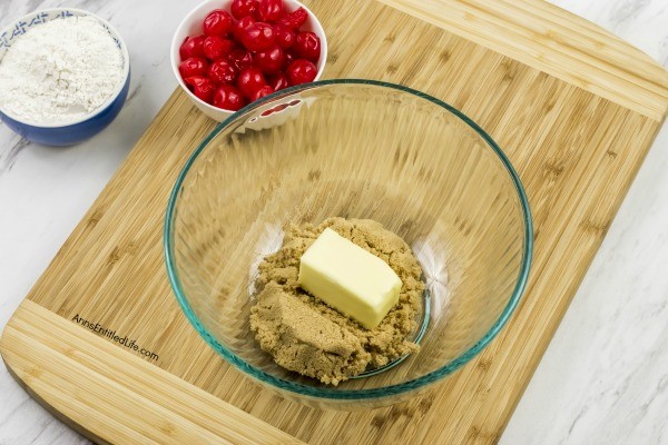 Cherry Cordial Cookies Recipe. A sinfully decadent chocolate cookie surrounds a cherry surprise in the middle! These easy to make cookies are fun and delicious. Your friends and family will love these tasty cookie treats!