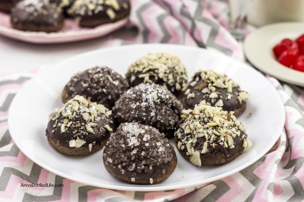 Cherry Cordial Cookies Recipe. A sinfully decadent chocolate cookie surrounds a cherry surprise in the middle! These easy to make cookies are fun and delicious. Your friends and family will love these tasty cookie treats!