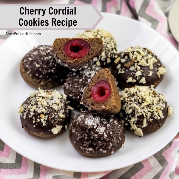 Cherry Cordial Cookies Recipe. A sinfully decadent chocolate cookie surrounds a cherry surprise in the middle! These easy to make cookies are fun and delicious. Your friends and family will love these tasty cookie treats!