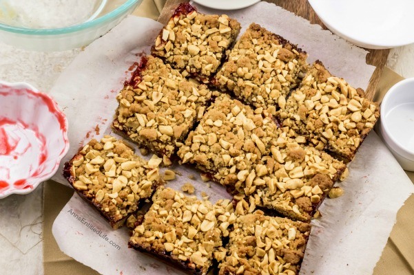 Easy Peanut Butter and Jelly Bars Recipe. If you are looking for an easy to make snack, a lunchbox sweet, or an after dinner dessert, look no further than this easy to make Peanut Butter and Jelly Bars Recipe. The great taste of old-fashioned PB&J in a delicious bar form. Your entire family will love these tasty treats!