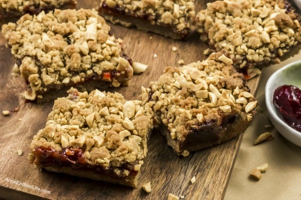 Easy Peanut Butter and Jelly Bars Recipe. If you are looking for an easy to make snack, a lunchbox sweet, or an after dinner dessert, look no further than this easy to make Peanut Butter and Jelly Bars Recipe. The great taste of old-fashioned PB&J in a delicious bar form. Your entire family will love these tasty treats!