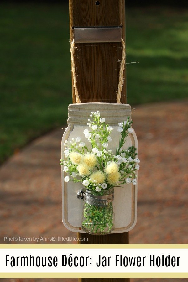 Farmhouse DÃ©cor: Jar Flower Holder. This adorable little jar flower holder is easy to make, rustic decor. Great for indoor or outdoor decorating, this sweet little bud vase fills in that small section of open wall space perfectly. This step-by-step tutorial will show you exactly how to make this simple DIY farmhouse dÃ©cor jar flower holder inexpensively.
