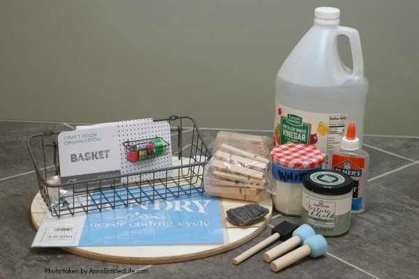 Farmhouse Décor: Laundry Room Organizer. Need to organize your laundry room? Looking for a place to store your outdoor clothesline clothespins? Make your own laundry room organizer! This adorable little DIY organizer is stylish and functional. A perfect place to keep clothespins, stain treatments, drier balls, and more, this rustic organizer is a farmhouse winner.