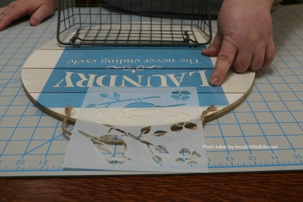 Farmhouse Décor: Laundry Room Organizer. Need to organize your laundry room? Looking for a place to store your outdoor clothesline clothespins? Make your own laundry room organizer! This adorable little DIY organizer is stylish and functional. A perfect place to keep clothespins, stain treatments, drier balls, and more, this rustic organizer is a farmhouse winner.