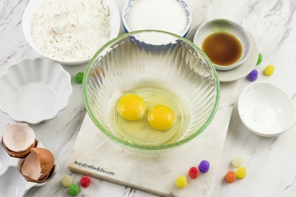 Gumdrop Cookie Bar Recipe. If you do not have a lot of time this holiday season (and who does?) this simple cookie bar is the perfect holiday treat to make for holiday gathering, lunchboxes, school treats, or to bring into the office. Festive, fun, and a snap to make, these Gumdrop Cookie Bars are great for children and adults alike.