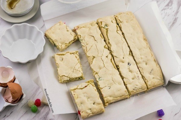 Gumdrop Cookie Bar Recipe. If you do not have a lot of time this holiday season (and who does?) this simple cookie bar is the perfect holiday treat to make for holiday gathering, lunchboxes, school treats, or to bring into the office. Festive, fun, and a snap to make, these Gumdrop Cookie Bars are great for children and adults alike.