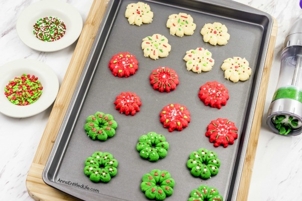 Spritz Cookie Recipe. This delicious, classic spritz cookie is a holiday cookie favorite. This fabulous recipe colors beautifully, tastes fantastic, and is very easy to make. This spritz cookie recipe freezes very well. Make these mouthwatering spritz cookies part of your holiday tradition. Yum!