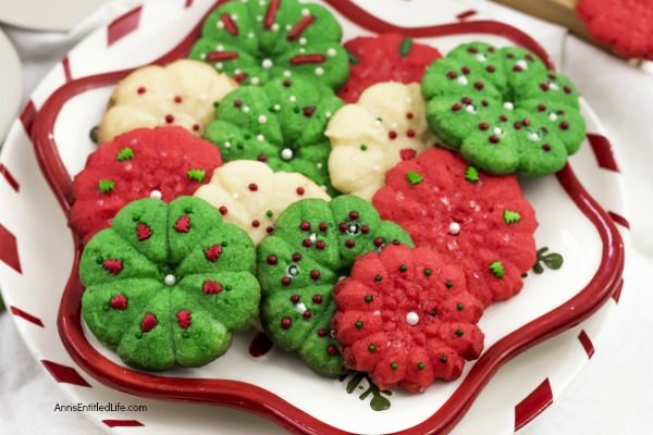 Spritz Cookie Recipe. This delicious, classic spritz cookie is a holiday cookie favorite. This fabulous recipe colors beautifully, tastes fantastic, and is very easy to make. This spritz cookie recipe freezes very well. Make these mouthwatering spritz cookies part of your holiday tradition. Yum!