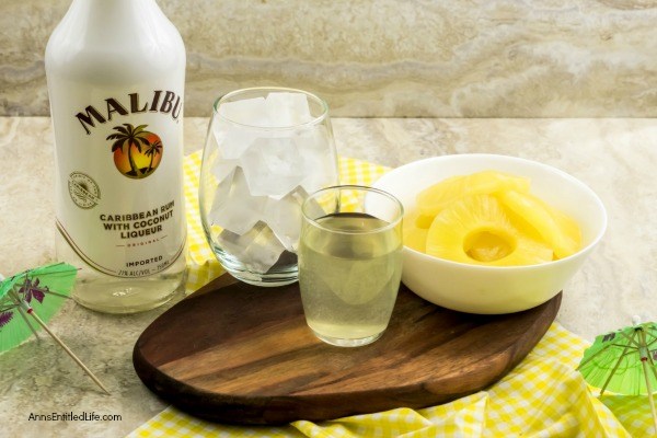 Pineapple Malibu Slushie Recipe. Mmmmm nothing beats a cold slushie on a hot summer day! This pineapple Malibu slushie cocktail is easy to make, frosty cold, and oh so delicious. Try one while sitting in the backyard, or lounging by the pool this weekend.