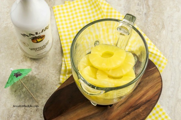 Pineapple Malibu Slushie Recipe. Mmmmm nothing beats a cold slushie on a hot summer day! This pineapple Malibu slushie cocktail is easy to make, frosty cold, and oh so delicious. Try one while sitting in the backyard, or lounging by the pool this weekend.