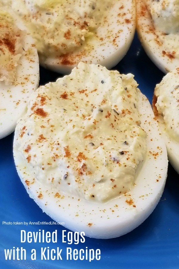 Up close photo of a deviled egg on a blue plate
