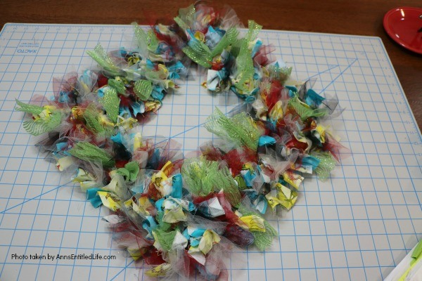 Wonky Dr. Seuss Inspired Wreath. This easy to make, wonky Dr. Seuss inspired wreath is great for all fans of Dr. Seuss literature and artwork. Fully customizable using these step-by-step instructions to reflect your favorite Dr. Seuss story, this wreath makes a wonderful gift for teachers, baby showers, a child's room, or your front door!