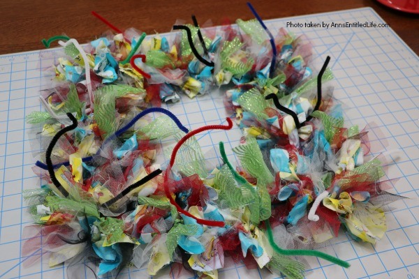 Wonky Dr. Seuss Inspired Wreath. This easy to make, wonky Dr. Seuss inspired wreath is great for all fans of Dr. Seuss literature and artwork. Fully customizable using these step-by-step instructions to reflect your favorite Dr. Seuss story, this wreath makes a wonderful gift for teachers, baby showers, a child's room, or your front door!